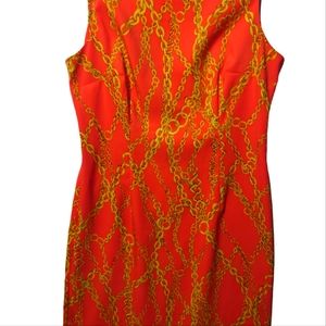 Ronnie Nicole sleeveless orange and gold dress.